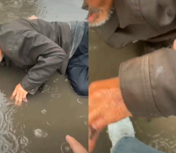 老人在雨中摔倒，男子录视频扶起老人，二人为何让人感到莫名可怜？